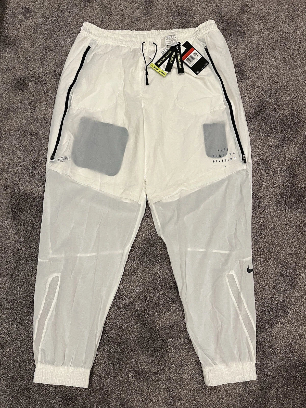 Pantalon de running Nike Division Pinnacle blanc, taille M homme, DA1288-100